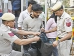 Parking attendants have been told to report unattended vehicles and ensure CCTV cameras are working to help prevent similar attacks. (Sanjeev Verma/HT)