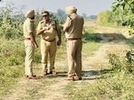 Police at the site of the encounter in Khan Khana on Tuesday. (HT Photo) Police at the site of the encounter in Khan Khana on Tuesday. (HT Photo)