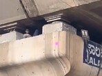A man was found sleeping inside a hollow flyover pillar in Bengaluru, attracting online attention and baffling commuters.