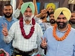 Udayveer Dhillon (extreme right) poses with his father and senior Congress leader Deepinder Singh Dhillon in Zirakpur on Tuesday. (HT Photo) Udayveer Dhillon (extreme right) poses with his father and senior Congress leader Deepinder Singh Dhillon in Zirakpur on Tuesday. (HT Photo)