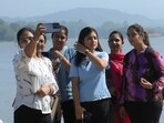 Visitors enjoying at Sukhna Lake in Chandigarh on Tuesday. (Keshav Singh/HT) Visitors enjoying at Sukhna Lake in Chandigarh on Tuesday. (Keshav Singh/HT)