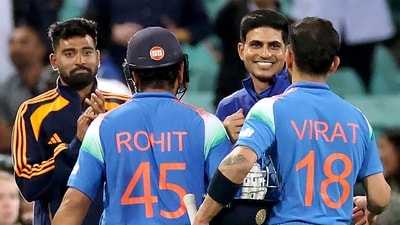 India�s Rohit Sharma and Virat Kohli are congratulated by India's captain Shubman Gill (2R) (AFP) India�s Rohit Sharma and Virat Kohli are congratulated by India's captain Shubman Gill (2R) (AFP)