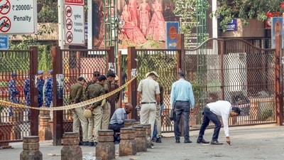 Forensic science laboratory officials collect samples from the explosion site near the Red fort premises in Delhi. The blast occurred in a Hyundai i20 car near the Red Fort Metro station on Monday evening. (Naveen Sharma/ANI) Forensic science laboratory officials collect samples from the explosion site near the Red fort premises in Delhi. The blast occurred in a Hyundai i20 car near the Red Fort Metro station on Monday evening. (Naveen Sharma/ANI)