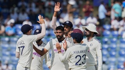 Mohammed Siraj celebrates a wicket with his teammates. (AP) Mohammed Siraj celebrates a wicket with his teammates. (AP)