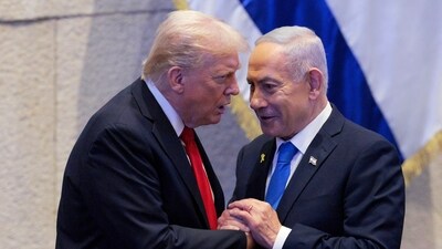 President Donald Trump talks with Israel's Prime Minister Benjamin Netanyahu at the Knesset, Israel's parliament, Monday, Oct. 13, 2025, in Jerusalem. (AP) President Donald Trump talks with Israel's Prime Minister Benjamin Netanyahu at the Knesset, Israel's parliament, Monday, Oct. 13, 2025, in Jerusalem. (AP)