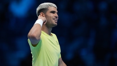 Spain's Carlos Alcaraz reacts after winning a point against United States' Taylor Fritz (AP)