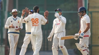 Delhi's Simarjeet Singh with teammates celebrates (PTI) Delhi's Simarjeet Singh with teammates celebrates (PTI)