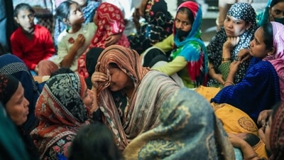 Family members and relatives of the e-rickshaw driver Jumman, who was killed in the blast near Red Fort, mourn after his mortal remains were brought to his residence, in New Delhi, Tuesday. (PTI) Family members and relatives of the e-rickshaw driver Jumman, who was killed in the blast near Red Fort, mourn after his mortal remains were brought to his residence, in New Delhi, Tuesday. (PTI)