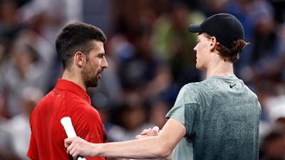 Italy's Jannik Sinner and Serbia's Novak Djokovic shake hands after a match at the French Open. (REUTERS)