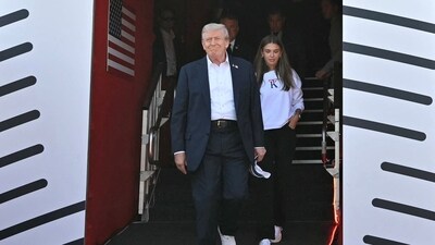 U.S. President Donald Trump and his granddaughter Kai Trump attend the 45th Ryder Cup golf competition at Bethpage Black Golf Course in Farmingdale, New York. (via REUTERS)