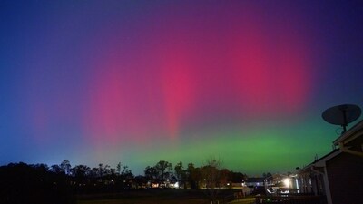 Northern Lights, also called aurora borealis, illuminate the night sky in Johnston, Iowa, U.S., November 11, 2025, (Brian Owens via REUTERS)