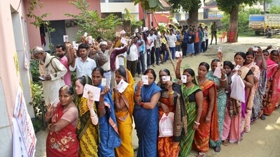Voters wait in a queue to cast their vote for the second phase of the Bihar assembly election, in Jehanabad on Tuesday. (ANI Photo) (ANI) Voters wait in a queue to cast their vote for the second phase of the Bihar assembly election, in Jehanabad on Tuesday. (ANI Photo) (ANI)