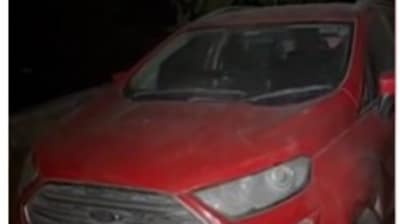 The red Ecosport, registered at the Rajouri Garden RTO in Delhi, was found parked outside a house in the village The red Ecosport, registered at the Rajouri Garden RTO in Delhi, was found parked outside a house in the village