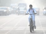 A student going to school on a smoggy morning amid rising levels of air pollution in Noida. A student going to school on a smoggy morning amid rising levels of air pollution in Noida.