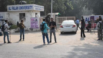 A bomb squad team arrives at Al-Falah University in Dhauj, Faridabad, to inspect a Maruti Brezza car found parked on the campus. (HT Photo) A bomb squad team arrives at Al-Falah University in Dhauj, Faridabad, to inspect a Maruti Brezza car found parked on the campus. (HT Photo)