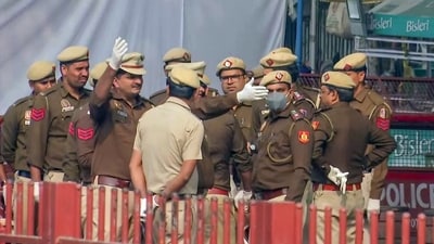 Delhi police personnel conduct an investigation at the site of the car blast near Red Fort, in New Delhi on Thursday. (ANI Video Grab) (ANI ) Delhi police personnel conduct an investigation at the site of the car blast near Red Fort, in New Delhi on Thursday. (ANI Video Grab) (ANI )