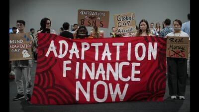 Activists participate in a demonstration for climate finance at the COP30 UN Climate Summit in Belem, Brazil, on Thursday. (AP) Activists participate in a demonstration for climate finance at the COP30 UN Climate Summit in Belem, Brazil, on Thursday. (AP)
