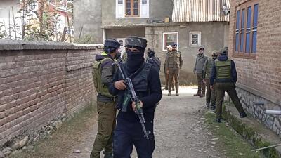 Armed personnel cordon off an area during a search operation in Anantnag on Wednesday. Searches have been intensified in the Kashmir Valley since the Red Fort blast in Delhi on November 10. (PTI Photo)