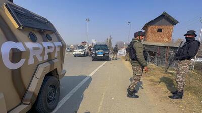 Armed personnel keeping vigil along the Jammu-Srinagar National Highway following the Delhi bomb blast, in Anantnag on Thursday. (PTI Photo) Armed personnel keeping vigil along the Jammu-Srinagar National Highway following the Delhi bomb blast, in Anantnag on Thursday. (PTI Photo)