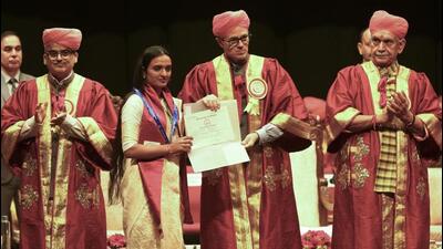 Lieutenant governor Manoj Sinha (extreme right) looks on as chief minister Omar Abdullah (centre) hands over a degree to a graduate during the 19th convocation of Jammu University on Thursday. (PTI Photo) Lieutenant governor Manoj Sinha (extreme right) looks on as chief minister Omar Abdullah (centre) hands over a degree to a graduate during the 19th convocation of Jammu University on Thursday. (PTI Photo)