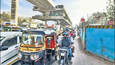 Mumbai, India. Feb 12, 2024 - A bottleneck at Dahisar toll plaza, north bound. Bottleneck is causing daily traffic jams for commuters.due to Metro pillar construction work near Dahisar toll plaza. Feb 12,2024. (Photo by Raju Shinde/HT Photo) Mumbai, India. Feb 12, 2024 - A bottleneck at Dahisar toll plaza, north bound. Bottleneck is causing daily traffic jams for commuters.due to Metro pillar construction work near Dahisar toll plaza. Feb 12,2024. (Photo by Raju Shinde/HT Photo)
