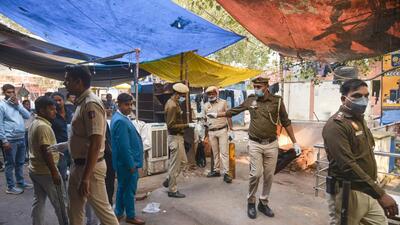 Security personnel examine the site of a car explosion near the Red Fort, in New Delhi on Thursday. (ANI) Security personnel examine the site of a car explosion near the Red Fort, in New Delhi on Thursday. (ANI)