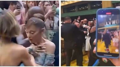 Ariana Grande looked shocked as a fan charged on her at the event. Ariana Grande looked shocked as a fan charged on her at the event.