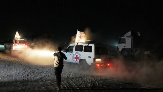 Red Cross convoy carrying the body of a person believed to be a deceased hostage handed over by Hamas militants makes its way toward the border crossing with Israel, to be transferred to Israeli authorities, in Deir al-Balah, central Gaza Strip, Thursday, Nov. 13, 2025. (AP)