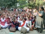 Anganwadi workers protesting outside the Child Development Project Office in Ludhiana on Friday. (Gurpreet Singh/HT)