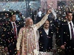Indian Prime Minister Narendra Modi showered with confetti on his arrival at the headquarters of the Bhartiya Janata Party in New Delhi after the National Democratic Alliance led by his party headed toward a landslide victory in the Bihar Indian Prime Minister Narendra Modi showered with confetti on his arrival at the headquarters of the Bhartiya Janata Party in New Delhi after the National Democratic Alliance led by his party headed toward a landslide victory in the Bihar