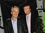 A banner of Jeffrey Epstein and President Donald Trump displayed during a protest earlier this year.