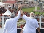 PM Modi raising Nitish Kumar's arm for the crowds, in a photo shared by the BJP. PM Modi raising Nitish Kumar's arm for the crowds, in a photo shared by the BJP.