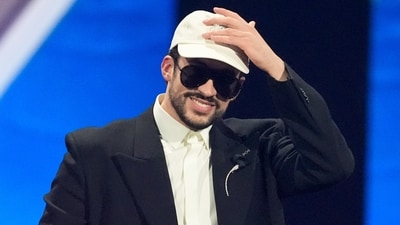 Bad Bunny accepts the award for record of the year during the 2025 Latin Grammys on Thursday. (Chris Pizzello/Invision/AP) Bad Bunny accepts the award for record of the year during the 2025 Latin Grammys on Thursday. (Chris Pizzello/Invision/AP)