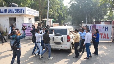 NIA and the crime branch team at Al Falah University, located at the Dhauj road in Faridabad. (Parveen Kumar/Hindustan Times) NIA and the crime branch team at Al Falah University, located at the Dhauj road in Faridabad. (Parveen Kumar/Hindustan Times)