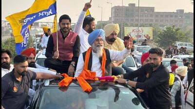 Aam Aadmi Party’s Harmeet Singh Sandhu during a road show after winning the Tarn Taran byelection on Friday. (HT Photo)