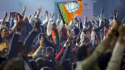 BJP supporters cheer during the celebration of NDA’s victory in the Bihar assembly elections, at BJP headquarters in New Delhi, on Friday. (PTI) BJP supporters cheer during the celebration of NDA’s victory in the Bihar assembly elections, at BJP headquarters in New Delhi, on Friday. (PTI)
