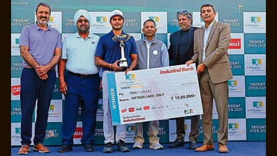 From left: PGTI CEO Amandeep Johl, Chandigarh Golf Club president Ravibir Singh, Trident Open champion Manu Gandas, Trident Group chairman Rajinder Gupta, former Indian cricket team captain and PGTI president Kapil Dev, and Shayan Basu, EVP & zonal head, North 2, IndusInd Bank, during the prize distribution ceremony at the Chandigarh Golf Club on Friday. (HT Photo) From left: PGTI CEO Amandeep Johl, Chandigarh Golf Club president Ravibir Singh, Trident Open champion Manu Gandas, Trident Group chairman Rajinder Gupta, former Indian cricket team captain and PGTI president Kapil Dev, and Shayan Basu, EVP & zonal head, North 2, IndusInd Bank, during the prize distribution ceremony at the Chandigarh Golf Club on Friday. (HT Photo)