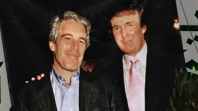 A banner of Jeffrey Epstein and President Donald Trump displayed during a protest earlier this year. (REUTERS)