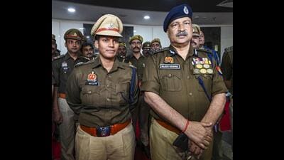 Women’s cricket team all-rounder and UP Police DSP Deepti Sharma meets the state’s DGP Rajeev Krishna during her visit to the UP Police Headquarters, in Lucknow, Friday. (PTI Photo)