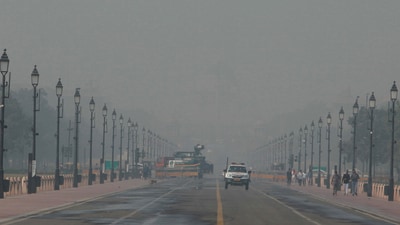 People walk at Kartavya Path amid smog as air quality remains in the 'Poor' category, in New Delhi on Friday. (ANI Photo) (Sathiya) People walk at Kartavya Path amid smog as air quality remains in the 'Poor' category, in New Delhi on Friday. (ANI Photo) (Sathiya)