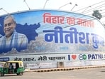 A view of poster of Bihar Chief Minister Nitish Kumar near Tara Mandal in Patna.