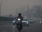 A dense layer of haze seen on the Gurugram–Sohna Elevated Road during the early morning hours near Subhash Chowk on Saturday. (Parveen Kumar/HT) A dense layer of haze seen on the Gurugram–Sohna Elevated Road during the early morning hours near Subhash Chowk on Saturday. (Parveen Kumar/HT)