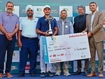 From left: PGTI CEO Amandeep Johl, Chandigarh Golf Club president Ravibir Singh, Trident Open champion Manu Gandas, Trident Group chairman Rajinder Gupta, former Indian cricket team captain and PGTI president Kapil Dev, and Shayan Basu, EVP & zonal head, North 2, IndusInd Bank, during the prize distribution ceremony at the Chandigarh Golf Club on Friday. (HT Photo) From left: PGTI CEO Amandeep Johl, Chandigarh Golf Club president Ravibir Singh, Trident Open champion Manu Gandas, Trident Group chairman Rajinder Gupta, former Indian cricket team captain and PGTI president Kapil Dev, and Shayan Basu, EVP & zonal head, North 2, IndusInd Bank, during the prize distribution ceremony at the Chandigarh Golf Club on Friday. (HT Photo)