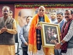 Union Defence Minister Rajnath Singh being welcomed by party workers as he arrives to attend the meeting, in Lucknow on Saturday. (ANI)