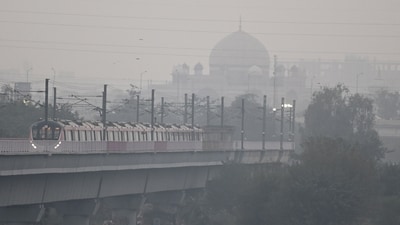 A metro train moves along the tracks near NH-24, shrouded in dense smog as air pollution continues to grip the area, in New Delhi, India, on Saturday, November 15, 2025. (RAJ K RAJ /HT PHOTO) A metro train moves along the tracks near NH-24, shrouded in dense smog as air pollution continues to grip the area, in New Delhi, India, on Saturday, November 15, 2025. (RAJ K RAJ /HT PHOTO)