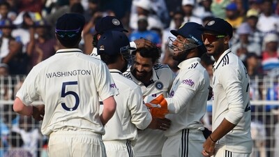 Indian players celebrate a wicket on second day of the First Test match at Eden Gardens in Kolkata. (Samir Jana/ Hindustan Times) Indian players celebrate a wicket on second day of the First Test match at Eden Gardens in Kolkata. (Samir Jana/ Hindustan Times)