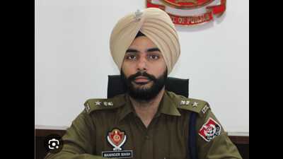 The Punjab government on Saturday ordered the suspension of Amritsar Rural Police senior superintendent of police (SSP) Maninder Singh for his alleged failure to take action against gangsters. (HT Photo) The Punjab government on Saturday ordered the suspension of Amritsar Rural Police senior superintendent of police (SSP) Maninder Singh for his alleged failure to take action against gangsters. (HT Photo)