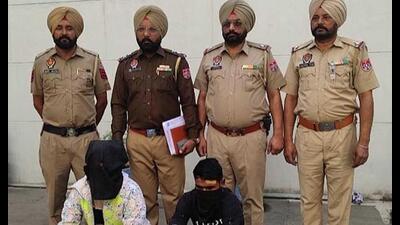 The two accused in police custody in Ludhiana on Saturday (HT Photo) The two accused in police custody in Ludhiana on Saturday (HT Photo)