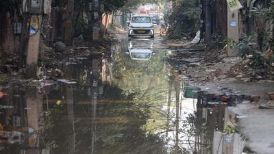 The waterlogged road in Sector 4 in Gurugram on Friday. (Parveen Kumar/HT) The waterlogged road in Sector 4 in Gurugram on Friday. (Parveen Kumar/HT)