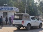 A crime branch team at the Al-Falah University on Sunday. (Parveen Kumar/HT Photo)